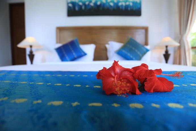 Imagen de la habitación del Hotel Budhi Ayu Villas and Cottages Ubud. Foto 14