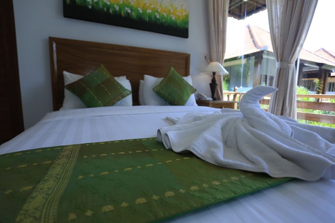 Imagen de la habitación del Hotel Budhi Ayu Villas and Cottages Ubud. Foto 15