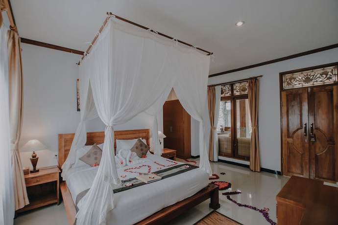 Imagen de la habitación del Hotel Budhi Ayu Villas and Cottages Ubud. Foto 16