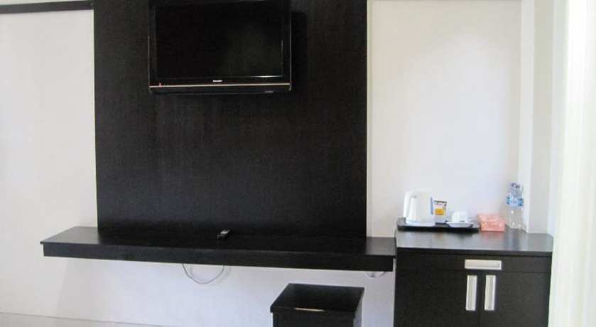 Imagen de la habitación del Hotel Budhi. Foto 13