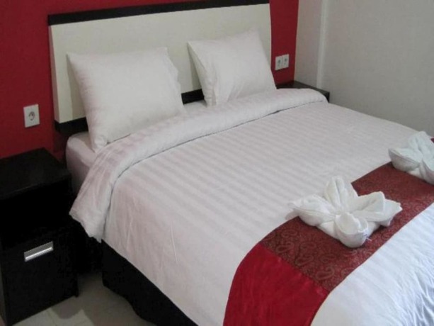 Imagen de la habitación del Hotel Budhi. Foto 15