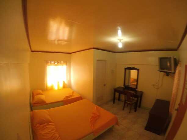 Imagen de la habitación del Hotel Buena Lynne\'s Resort Annex. Foto 11