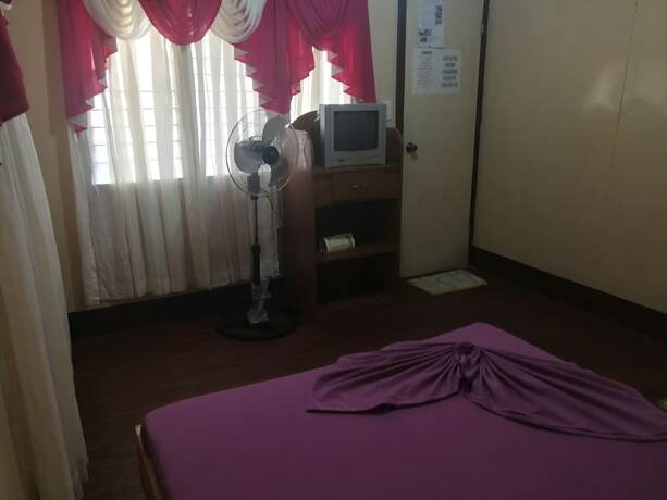 Imagen de la habitación del Hotel Buena Lynne\'s Resort Annex. Foto 15