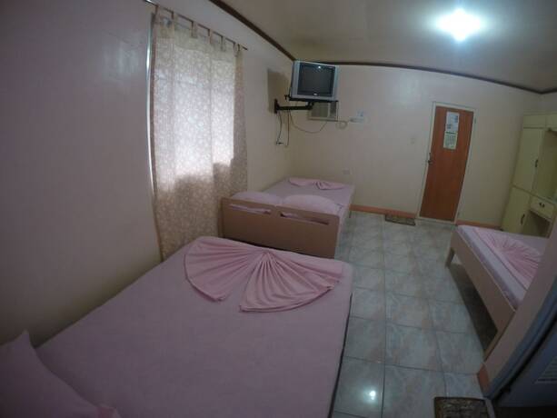 Imagen de la habitación del Hotel Buena Lynne\'s Resort Annex. Foto 16