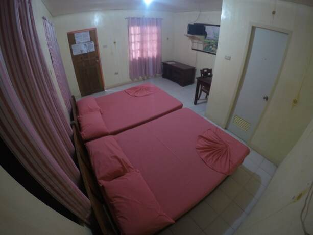 Imagen de la habitación del Hotel Buena Lynne\'s Resort Annex. Foto 17