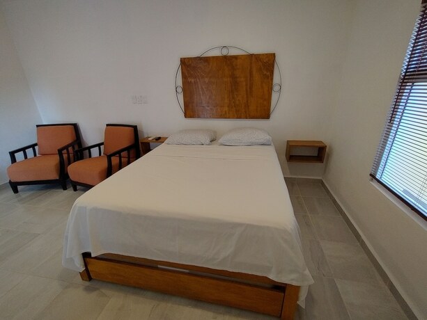 Imagen de la habitación del Hotel Buenosdias Izamal. Foto 17