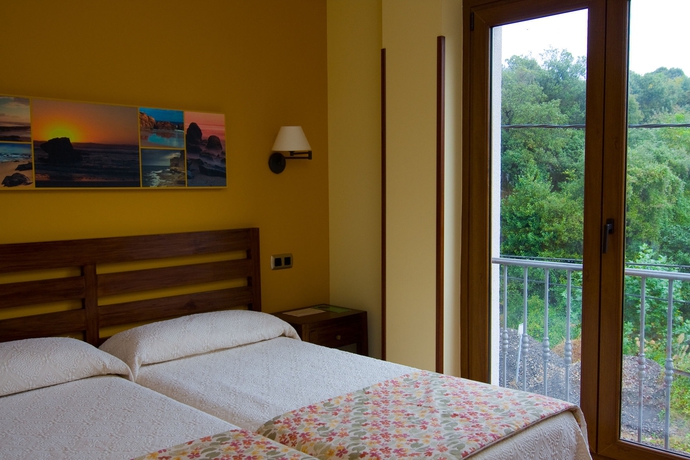 Imagen de la habitación del Hotel Bufón De Arenillas. Foto 7