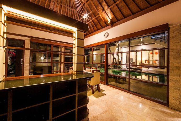 Imagen de la habitación del Hotel Bugan Villas. Foto 9