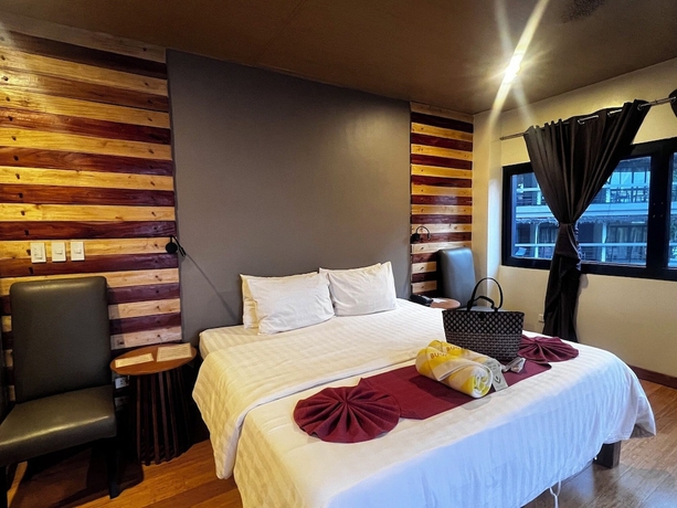 Imagen de la habitación del Hotel Bugana Beach and Dive Resort. Foto 10