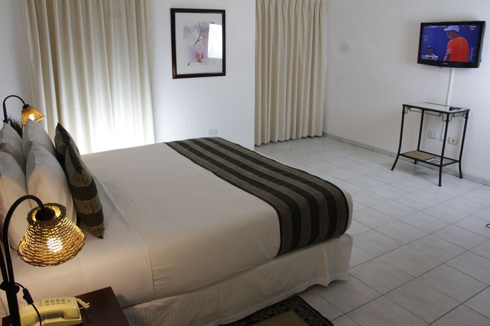 Imagen de la habitación del Hotel Buganvillas Suites and Spa. Foto 3