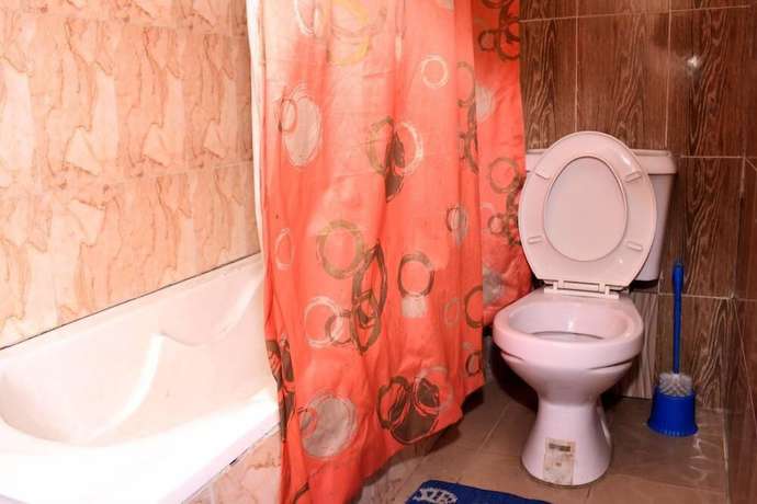 Imagen de la habitación del Hotel Buggatti and Suites. Foto 11