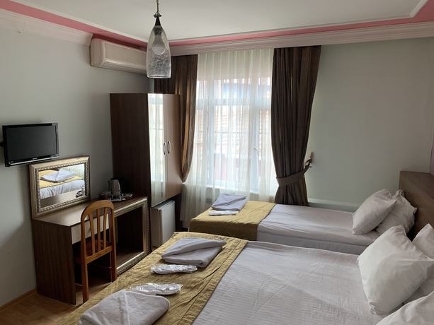 Imagen de la habitación del Hotel Buhara. Foto 14