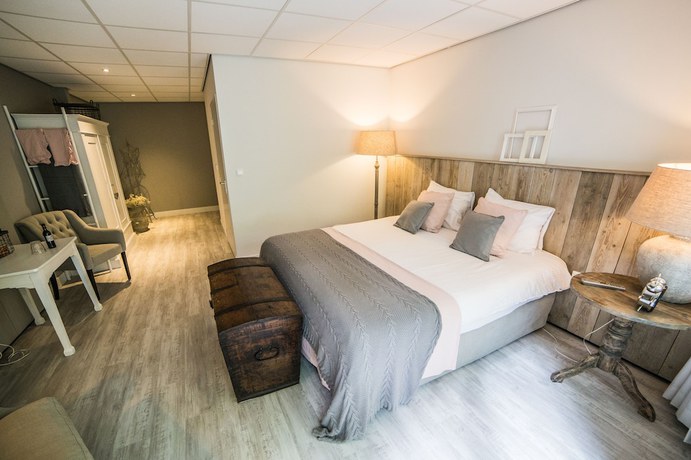 Imagen de la habitación del Hotel Buitenplaats De Bergse Bossen. Foto 10