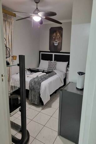 Imagen de la habitación del Hotel Bujumbura Guest House. Foto 19