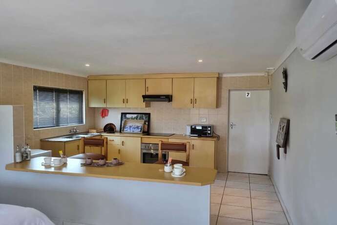 Imagen de la habitación del Hotel Bujumbura Guest House. Foto 21