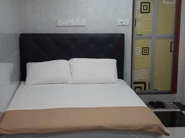 Imagen de la habitación del Hotel Bukit Beruntung Business. Foto 11