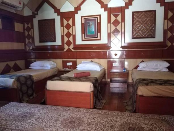 Imagen de la habitación del Hotel Bukit Keluang Beach Resort. Foto 4