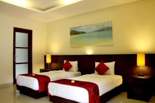 Imagen de la habitación del Hotel Bukit Kirana Villas. Foto 7