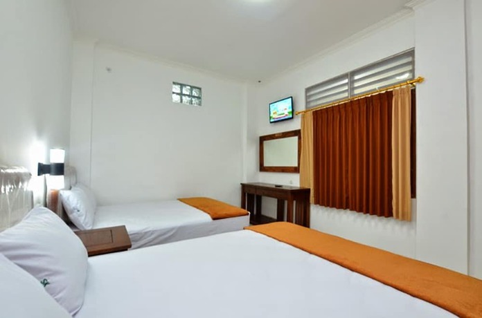 Imagen de la habitación del Hotel Bukit Uhud Yogyakarta. Foto 3