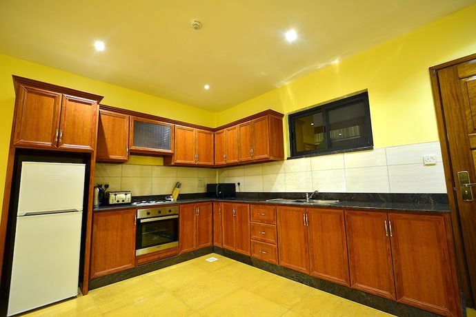 Imagen de la habitación del Hotel Bukoto Heights Apartments. Foto 11