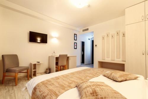 Imagen de la habitación del Hotel Bulevard, Ramnicu Valcea. Foto 8