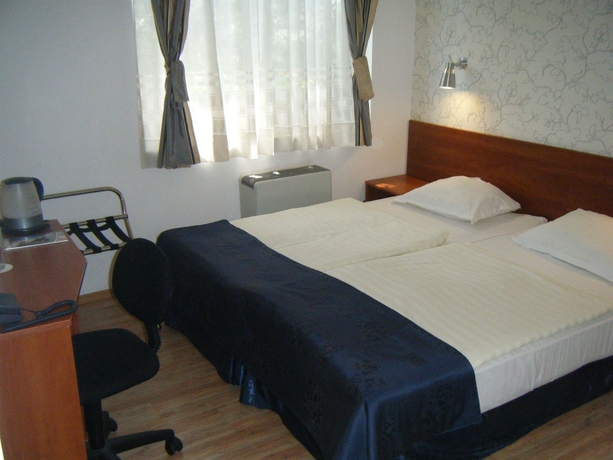 Imagen de la habitación del Hotel Bulgari boutique. Foto 2