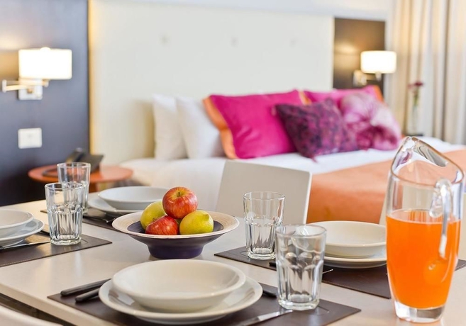 Imagen de la habitación del Hotel Bulnes Eco Suites. Foto 9