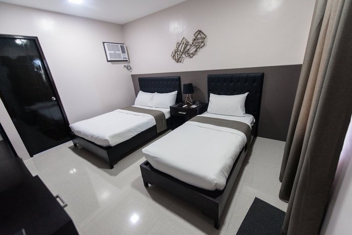 Imagen de la habitación del Hotel Bumble V Hotel Subic. Foto 8