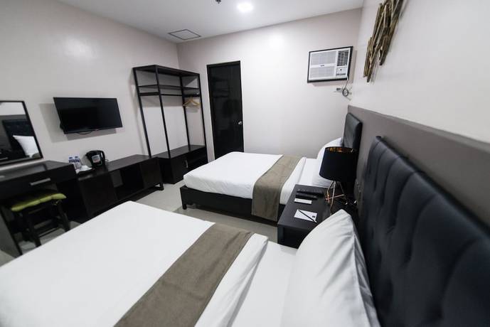 Imagen de la habitación del Hotel Bumble V Hotel Subic. Foto 9