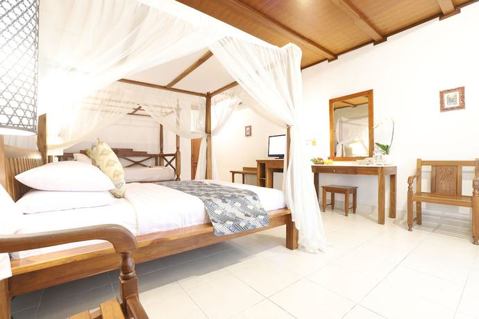Imagen de la habitación del Hotel Bumi Ayu Bungalows. Foto 3