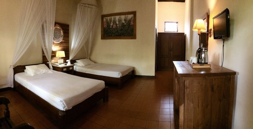 Imagen de la habitación del Hotel Bumi Ayu Bungalows. Foto 4