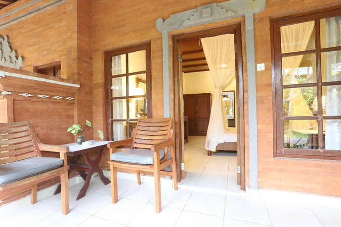 Imagen de la habitación del Hotel Bumi Ayu Bungalows. Foto 6