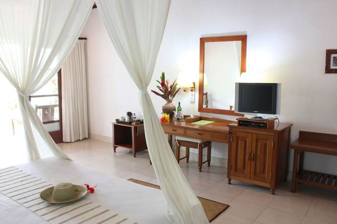 Imagen de la habitación del Hotel Bumi Ayu Bungalows. Foto 11