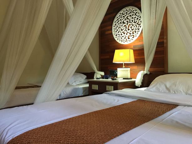 Imagen de la habitación del Hotel Bumi Ayu Bungalows. Foto 12