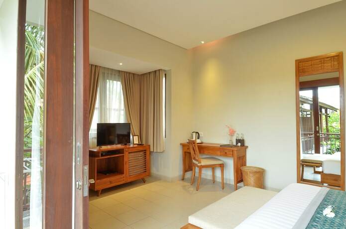 Imagen de la habitación del Hotel Bumi Muwa Ubud. Foto 17