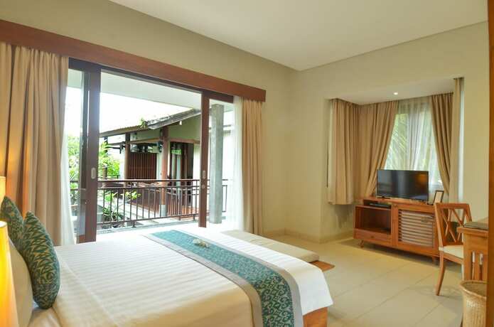 Imagen de la habitación del Hotel Bumi Muwa Ubud. Foto 18