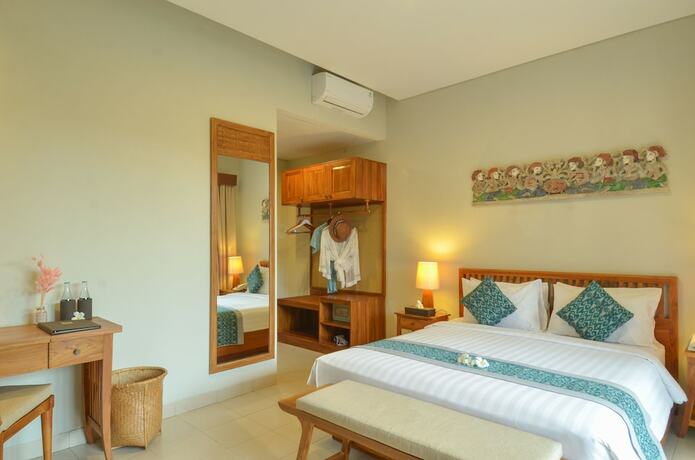 Imagen de la habitación del Hotel Bumi Muwa Ubud. Foto 19