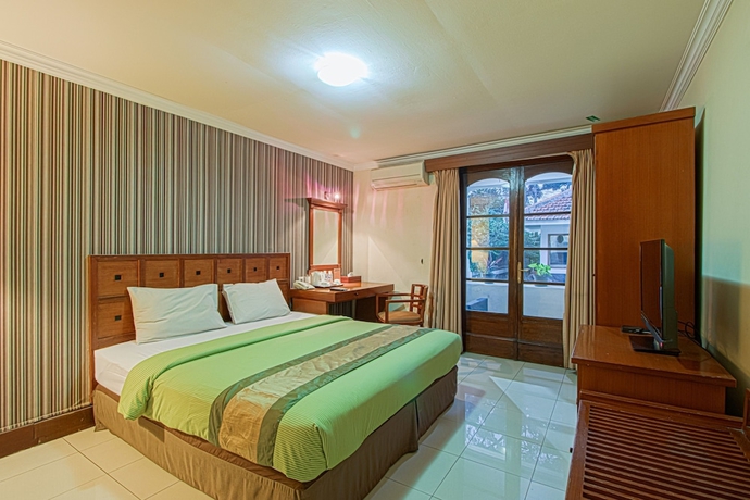 Imagen de la habitación del Hotel Bumi Sawunggaling. Foto 2