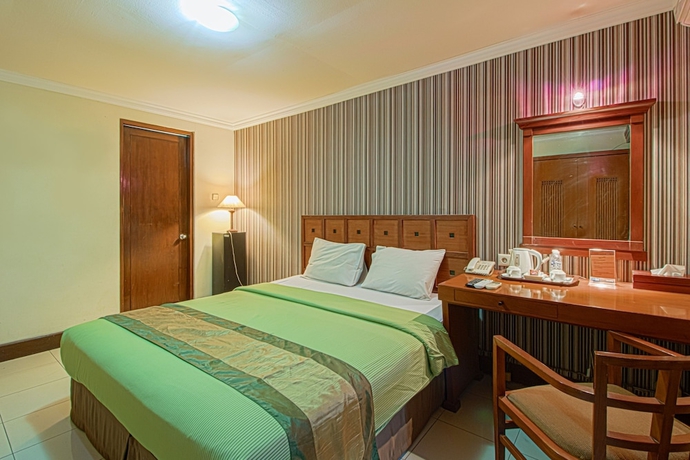 Imagen de la habitación del Hotel Bumi Sawunggaling. Foto 3