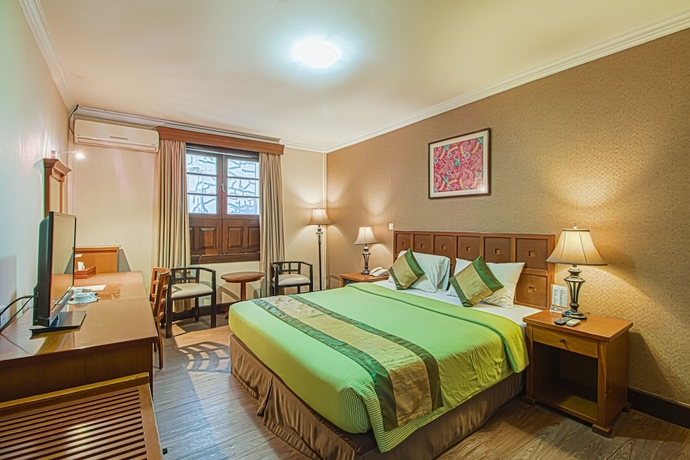 Imagen de la habitación del Hotel Bumi Sawunggaling. Foto 4