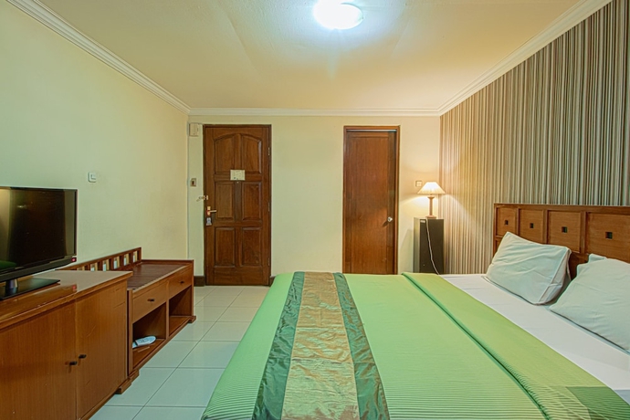 Imagen de la habitación del Hotel Bumi Sawunggaling. Foto 15
