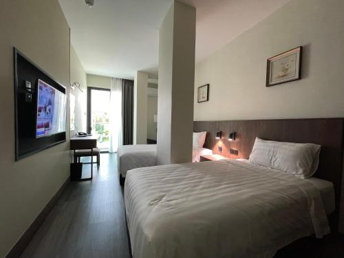 Imagen de la habitación del Hotel Bundusan. Foto 14