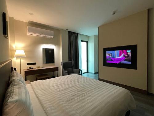 Imagen de la habitación del Hotel Bundusan. Foto 16
