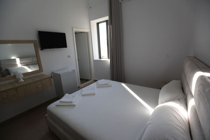 Imagen de la habitación del Hotel Bunec Beach Resort. Foto 15