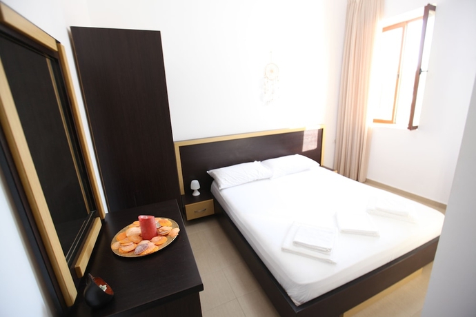 Imagen de la habitación del Hotel Bunec Beach Resort. Foto 19