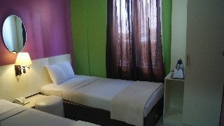 Imagen de la habitación del Hotel Bunga Bunga. Foto 6