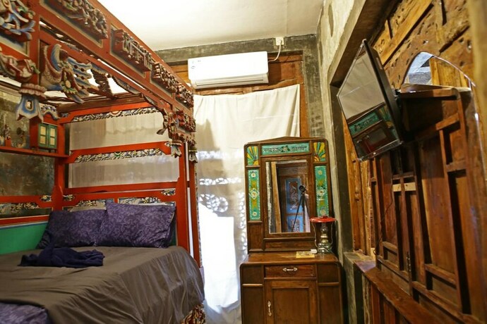 Imagen de la habitación del Hotel Bunga Desa Homestay Jimbaran. Foto 8