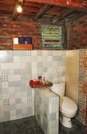 Imagen de la habitación del Hotel Bunga Desa Homestay Jimbaran. Foto 11