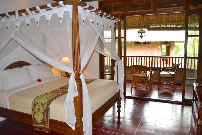 Imagen de la habitación del Hotel Bunga Permai. Foto 4