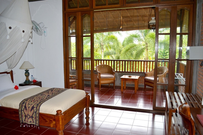 Imagen de la habitación del Hotel Bunga Permai. Foto 6